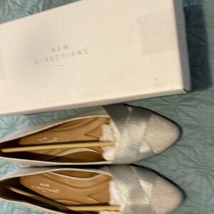 Dressy silver flats. Size 10. Never worn.
